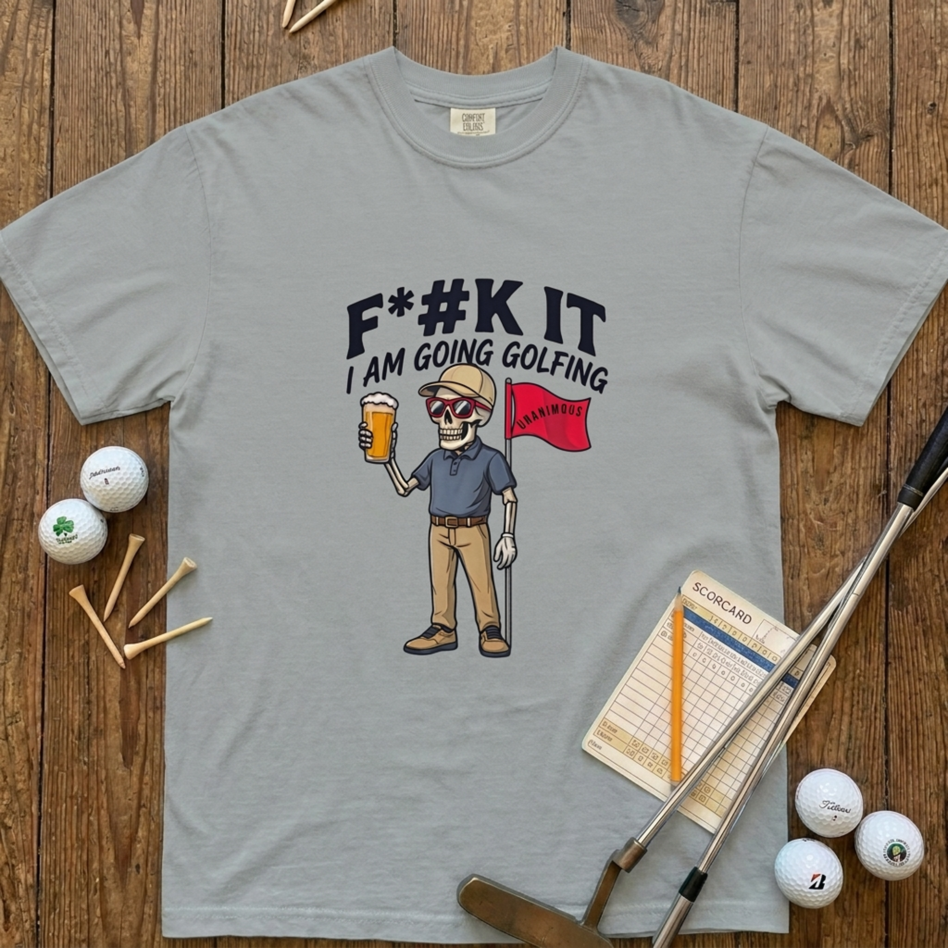 Cream Comfort Colors t-shirt with a skeleton golfer holding a beer and red flag, text reads F*#k It I'm Going Golfing