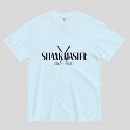 A light blue short-sleeve crewneck t-shirt with a black graphic on the chest reading 'SHANK MASTER' above and below crossed golf clubs, displayed flat against a neutral gray background.